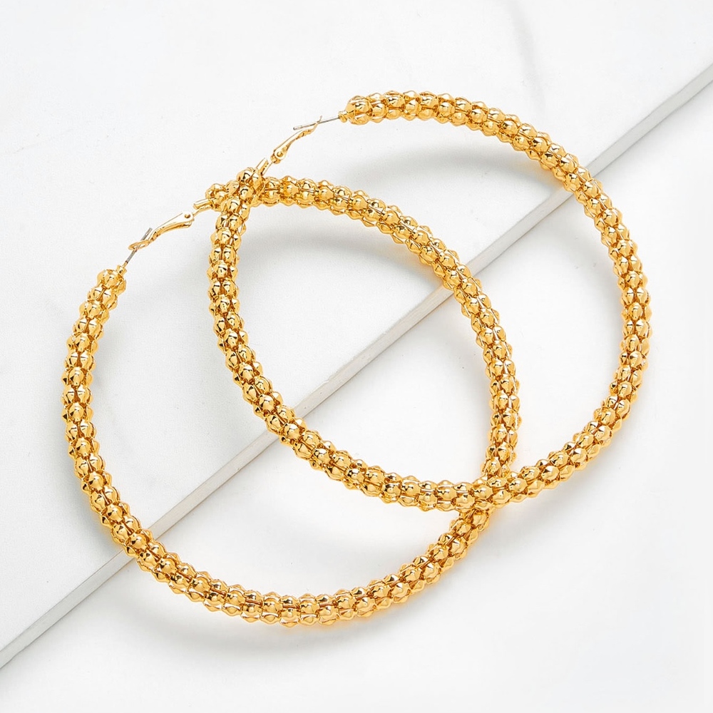 big gold hoop earrings